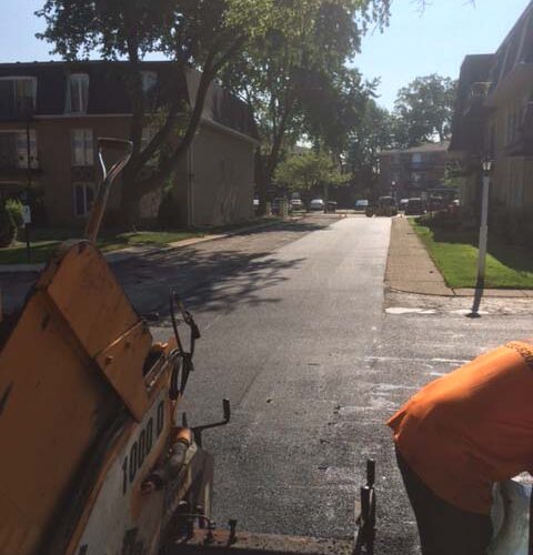 Progress on an asphalt driveway here in Bridgeview