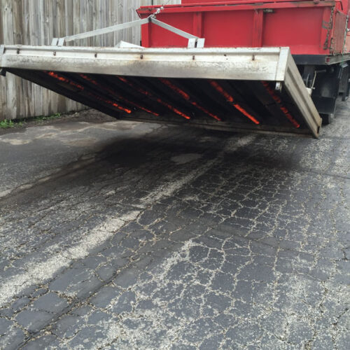 Asphalt patching done well by American Sealcoating & Maintenance